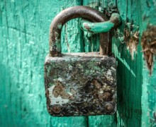 Rusty Padlock On Blue Door Rusty Padlock On Blue Door ALT
